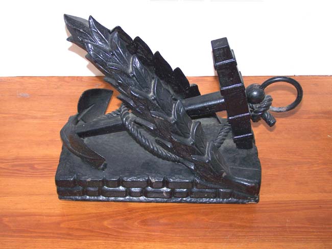 A 19th century cast iron top to a Nautical Trade Sign featuring an Anchor with laurel leaves,   